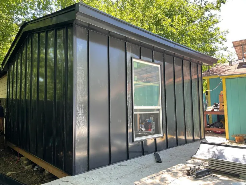 Black standing seam metal wall panels for Roof Inspection in Indian Wells